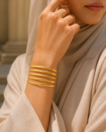 Zahra Braided Bangle worn by an Arab woman