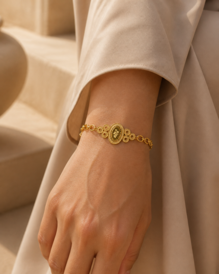 Zaman Oval Medallion Bracelet worn by an Arab woman